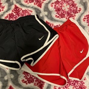 two pairs of nike shorts